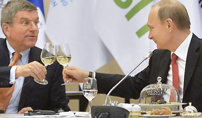 Before the Olympic Champagne Dried Up: IOC president Thomas Bach raises a glass with Vladimir Putin in the days when they were chums - photo courtesy of Jens Weinreich