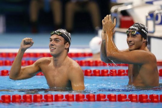 Lrtaeme and third placed Gabriele DETTI of Italy celebrate after competing in the men's 1500m Freestyle Final