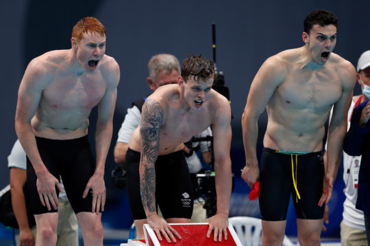 (l-r) Tom Dean, Matt Richards and James Guy yell Duncan Scott home - by Simone Castrovillari, courtesy of Speedo