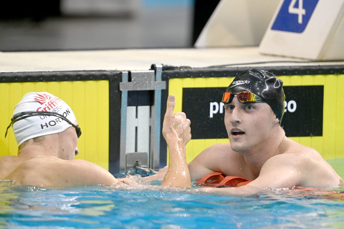 The winning Elijah Winnington and a thumbs up from Mack Horton, by Delly Carr, courtesy of Swimming Australia