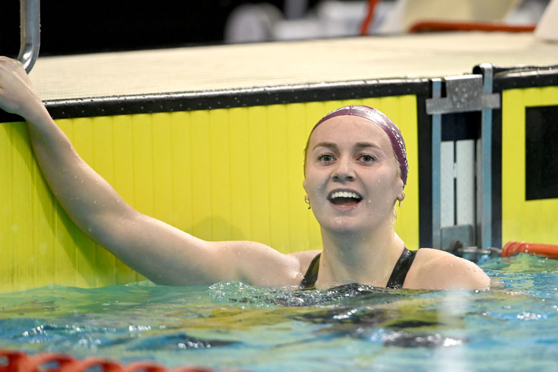 Ariarne Titmus celebrates her 3:56.40 World 400m free record, the first solo global standard of her career, in Adelaide - by Delly Carr, courtesy of Swimming Australia