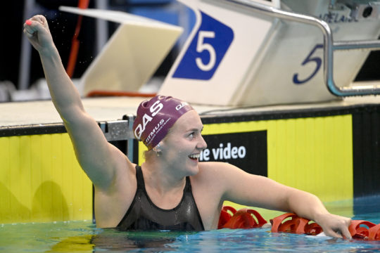 Ariarne Titmus celebrates her 3:56.40 World 400m free record, the first solo global standard of her career, in Adelaide - by Delly Carr, courtesy of Swimming Australia